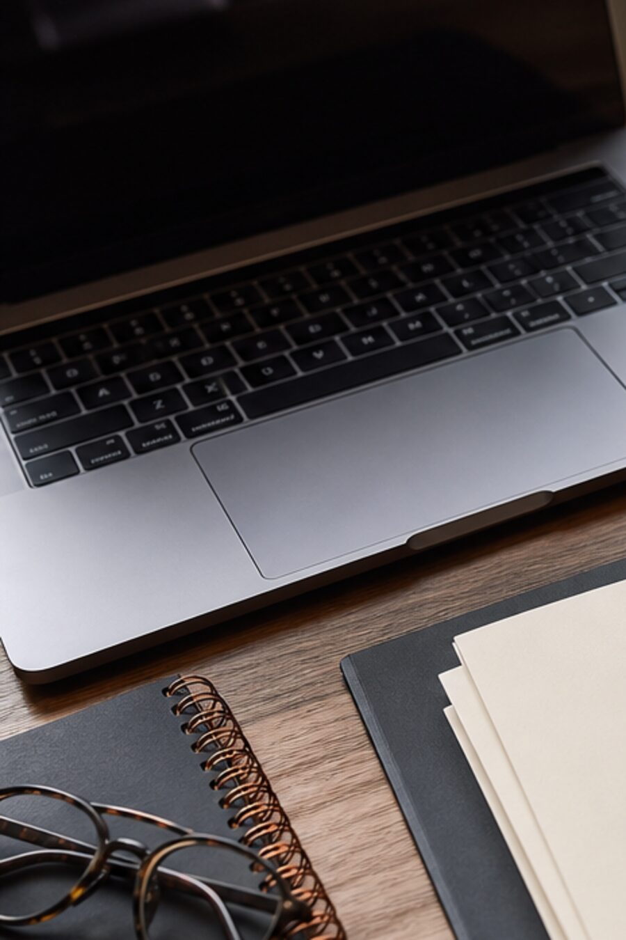 Onboarding paperwork on a warm-lit desk